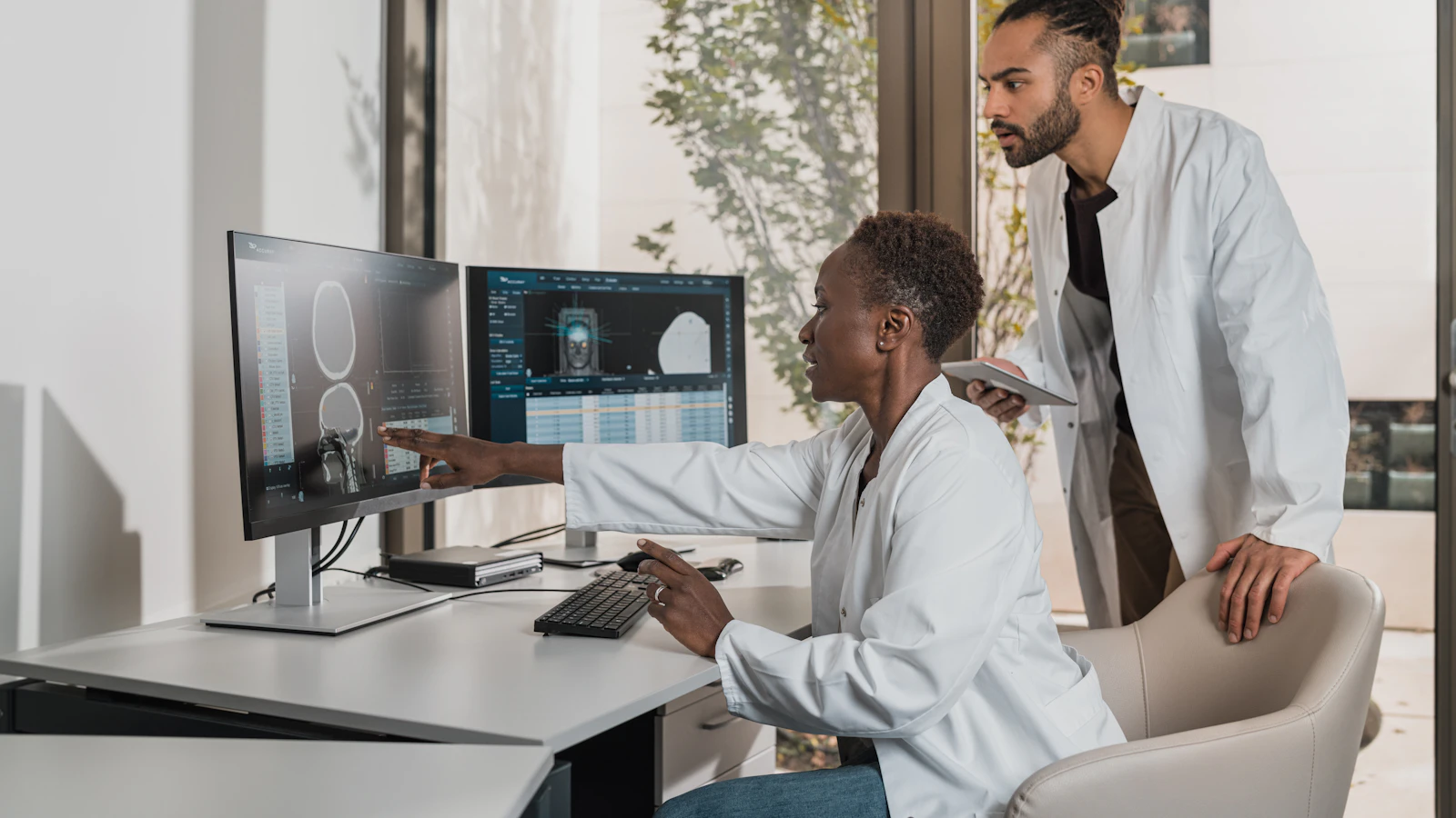 Someone reviewing results on a computer screen.
