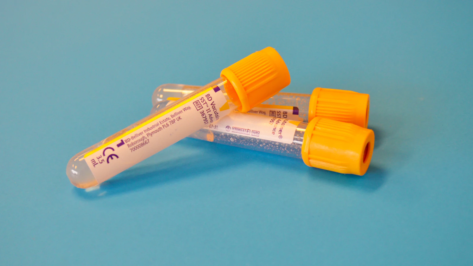 A test tube for laboratory analysis on a light surface.